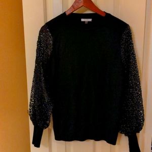 Black lace detail sleeve sweater.